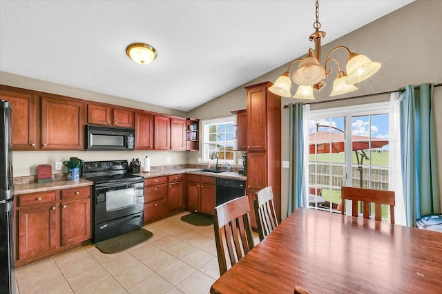 1321 W Ridge Ln, Champaign, IL 61822 - kitchen with black appliances, a chandelier, lofted ceiling, light tile patterned floors, and a sink