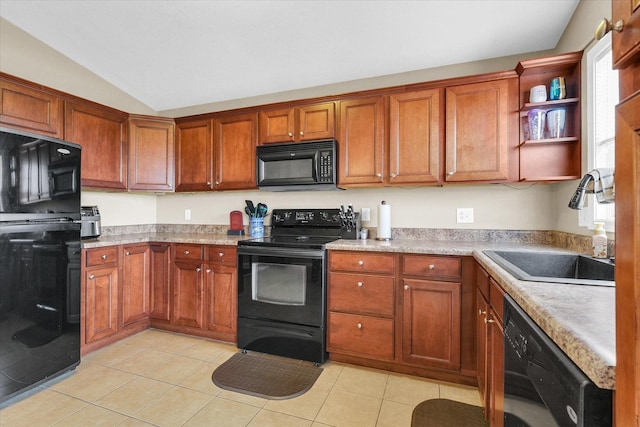 1321 W Ridge Ln, Champaign, IL 61822 - kitchen featuring black appliances, a sink, lofted ceiling, light countertops, and light tile patterned floors