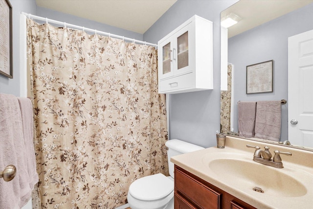 1321 W Ridge Ln, Champaign, IL 61822 - full bathroom with toilet, vanity, and a shower with shower curtain
