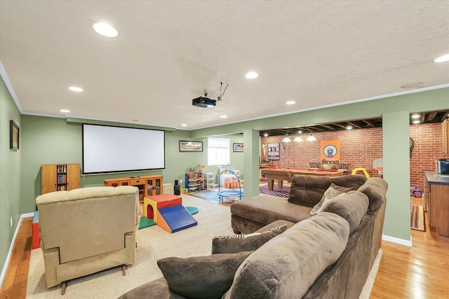 1321 W Ridge Ln, Champaign, IL 61822 - home theater with pool table, recessed lighting, brick wall, light wood-type flooring, and ornamental molding