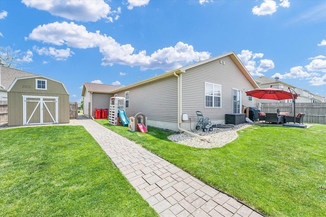 1321 W Ridge Ln, Champaign, IL 61822 - rear view of property featuring an outdoor hangout area and a patio