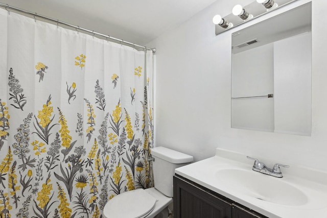 7131 166th St Unit 101, Tinley Park, IL 60477 - full bathroom with toilet, vanity, and a shower with shower curtain