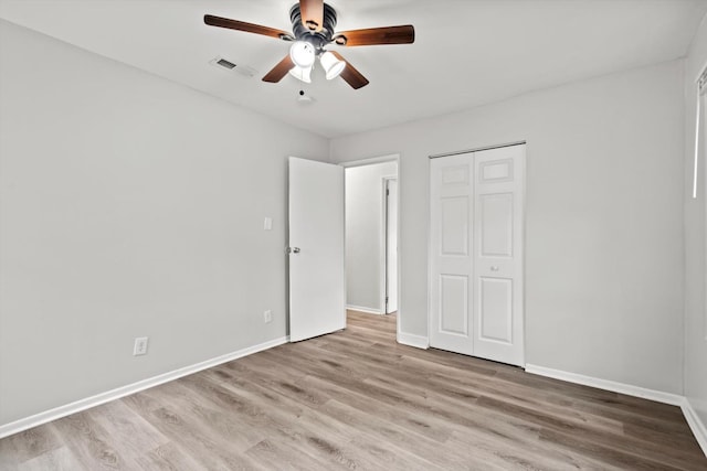 21643 Merrill Ave, Sauk Village, IL 60411 - unfurnished bedroom featuring wood finished floors and baseboards