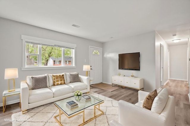 21643 Merrill Ave, Sauk Village, IL 60411 - living room featuring wood finished floors and baseboards