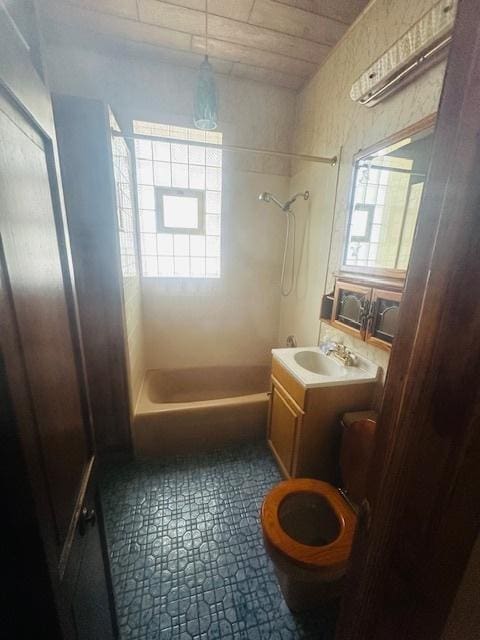 4001 S Albany Ave, Chicago, IL 60632 - bathroom featuring tub / shower combination, vanity, and toilet