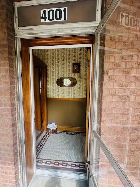 4001 S Albany Ave, Chicago, IL 60632 - view of exterior entry featuring brick siding