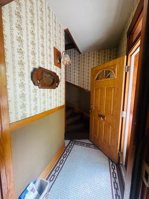 4001 S Albany Ave, Chicago, IL 60632 - hallway featuring wallpapered walls and a wainscoted wall