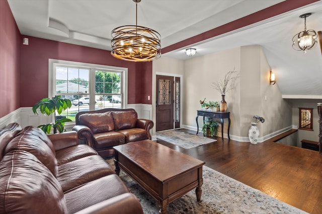 2952 W 100th Pl, Evergreen Park, IL 60805 - living room featuring a chandelier, wainscoting, and wood finished floors