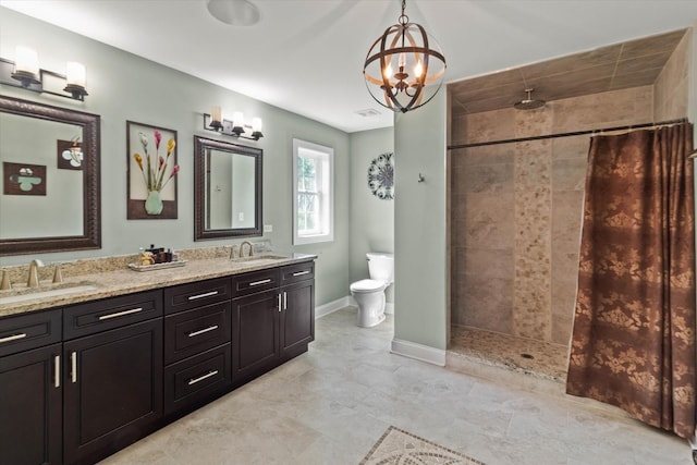 2952 W 100th Pl, Evergreen Park, IL 60805 - full bath featuring a tile shower, double vanity, toilet, a chandelier, and baseboards