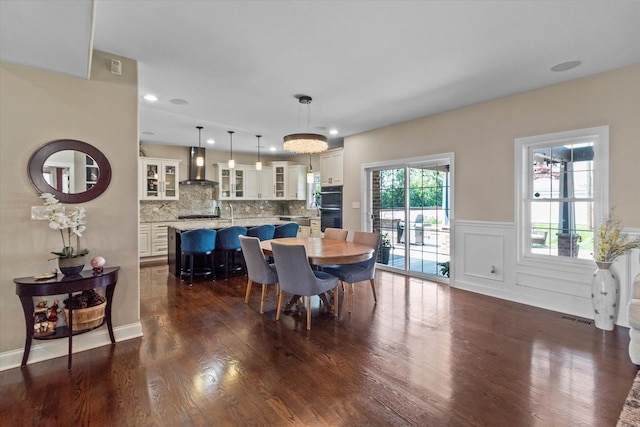 2952 W 100th Pl, Evergreen Park, IL 60805 - dining area featuring dark wood-style flooring, wainscoting, and recessed lighting
