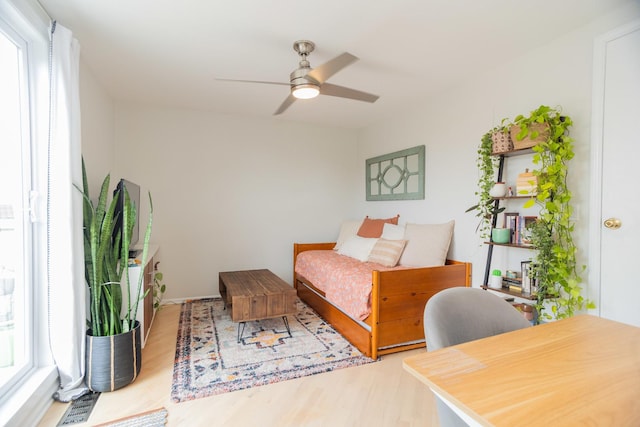 919 W Leland Ave Unit F, Chicago, IL 60640 - bedroom with wood finished floors, an office area, and ceiling fan