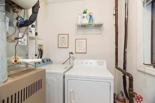 919 W Leland Ave Unit F, Chicago, IL 60640 - laundry room with washer and dryer and heating unit