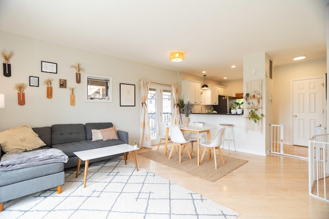 919 W Leland Ave Unit F, Chicago, IL 60640 - living area with light wood-style flooring and recessed lighting