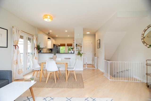 919 W Leland Ave Unit F, Chicago, IL 60640 - dining space featuring light wood-style floors, plenty of natural light, recessed lighting, and baseboards