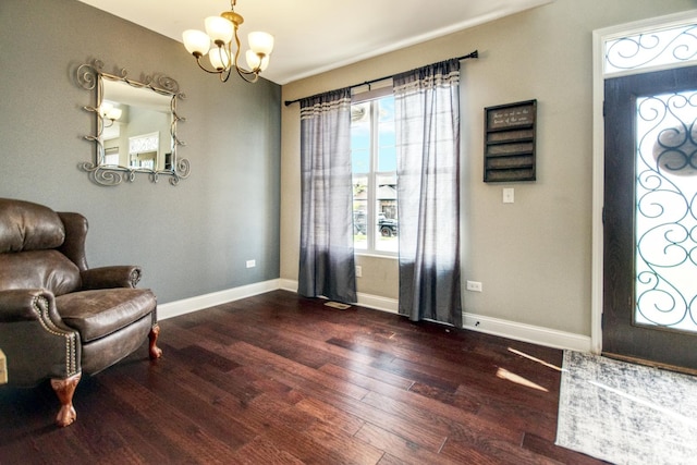 1472 S Saddlebrook Ln, Minooka, IL 60447 - entrance foyer featuring a chandelier, hardwood / wood-style floors, and baseboards