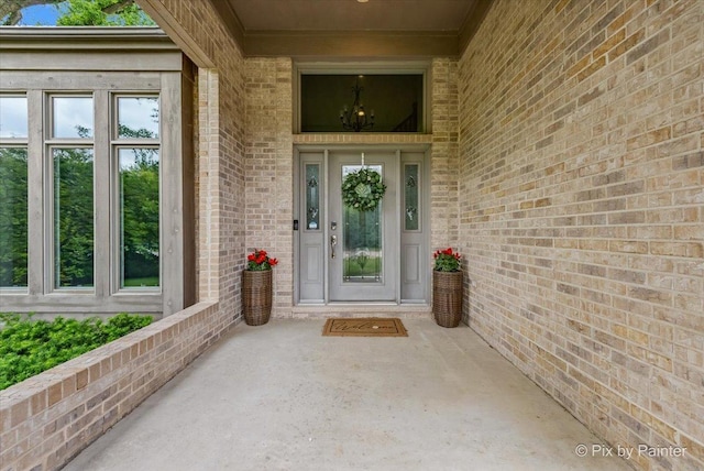 7530 Inverway Dr, Lakewood, IL 60014 - view of exterior entry featuring brick siding