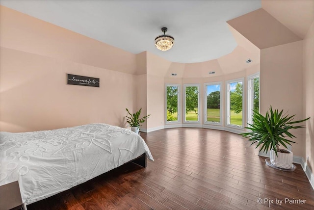 7530 Inverway Dr, Lakewood, IL 60014 - bedroom featuring baseboards, wood finished floors, and a chandelier