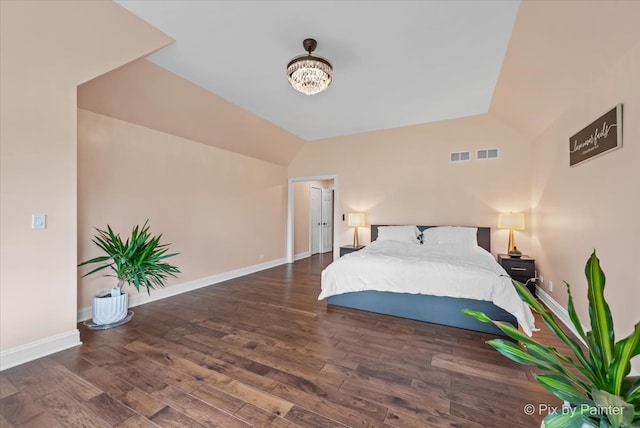 7530 Inverway Dr, Lakewood, IL 60014 - bedroom with wood finished floors, baseboards, and vaulted ceiling
