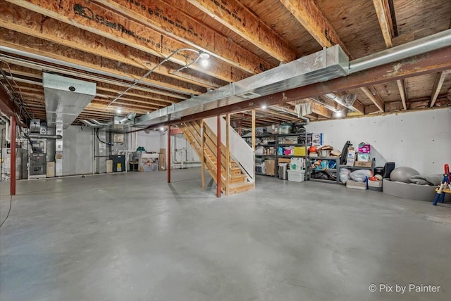 7530 Inverway Dr, Lakewood, IL 60014 - unfinished basement with stairway and heating unit