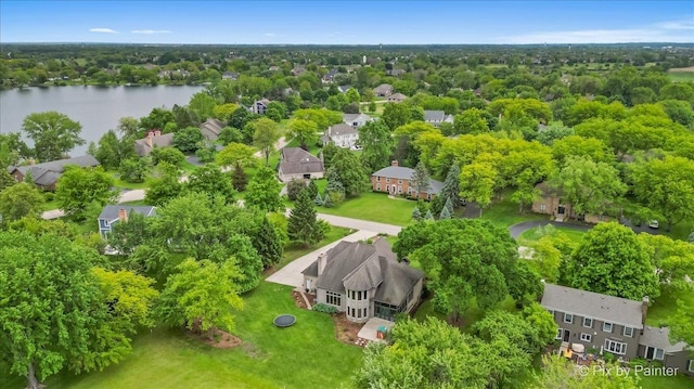 7530 Inverway Dr, Lakewood, IL 60014 - aerial view of residential area featuring a large body of water and a tree filled landscape