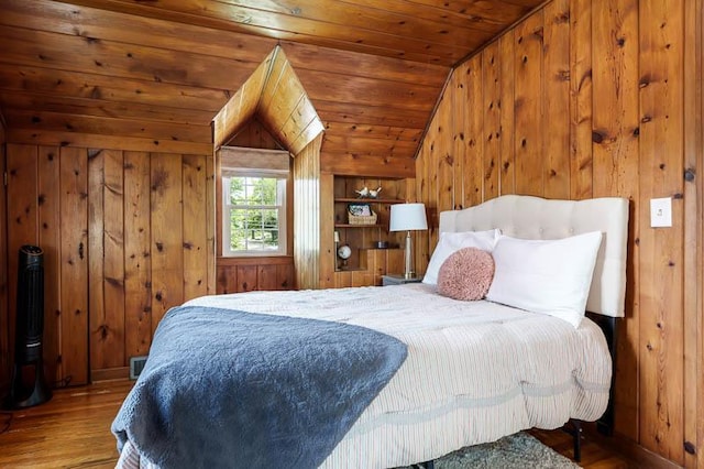 3803 Charles St, Rockford, IL 61108 - bedroom with wood finished floors, wooden ceiling, vaulted ceiling, and wooden walls