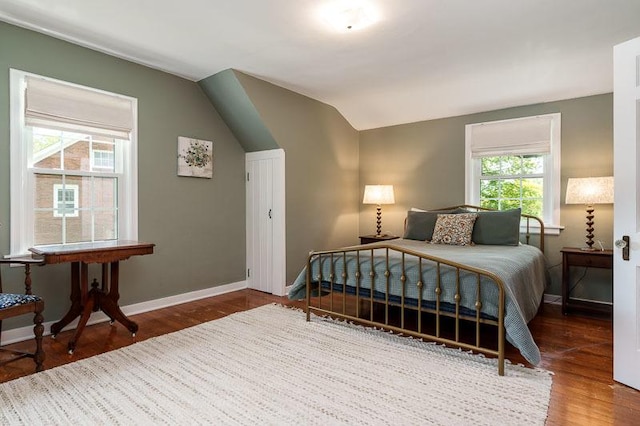 3803 Charles St, Rockford, IL 61108 - bedroom featuring baseboards, wood finished floors, and lofted ceiling