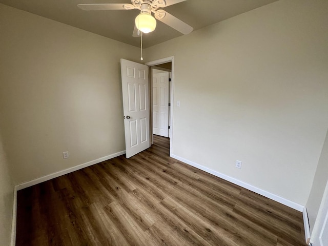2422 E Washington St, Urbana, IL 61802 - spare room with wood finished floors and a ceiling fan