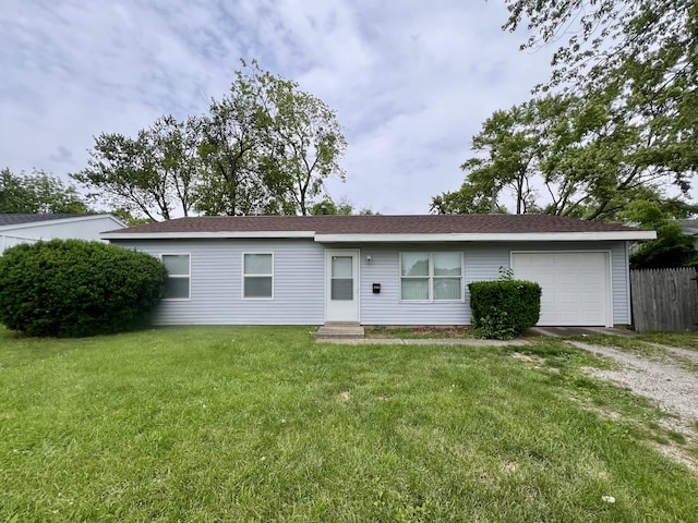 2422 E Washington St, Urbana, IL 61802 - ranch-style house with dirt driveway and a garage