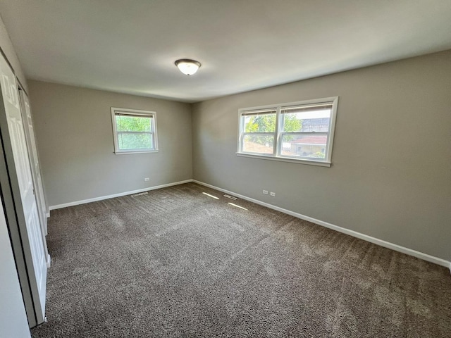 17415 Burnham Ave, Lansing, IL 60438 - carpeted empty room featuring baseboards