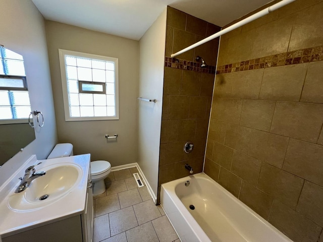 17415 Burnham Ave, Lansing, IL 60438 - bathroom with toilet, vanity, tile patterned flooring, shower / washtub combination, and baseboards