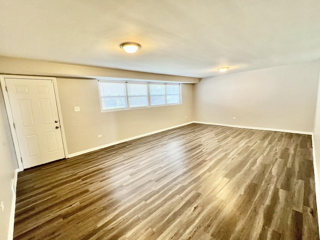 17415 Burnham Ave, Lansing, IL 60438 - empty room featuring dark wood-style floors and baseboards