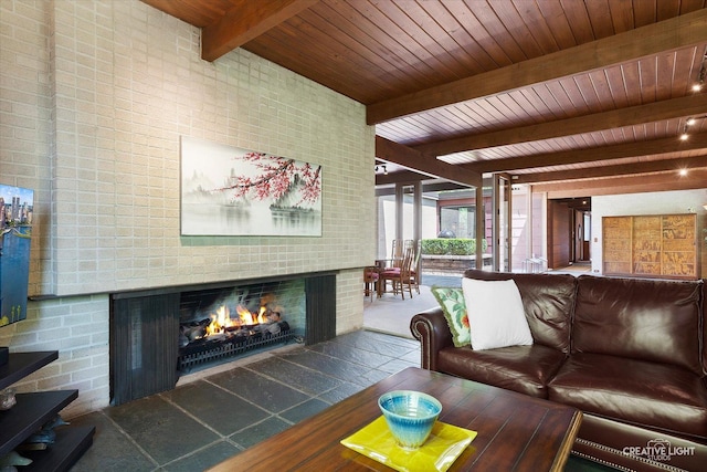 5N477 Curling Pond Rd, Wayne, IL 60184 - living area featuring a wooden ceiling with exposed beams, a fireplace, and brick wall