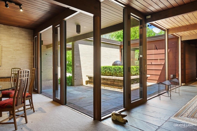 5N477 Curling Pond Rd, Wayne, IL 60184 - doorway featuring plenty of natural light, a wooden ceiling with exposed beams, and floor to ceiling windows