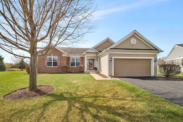 814 Glory Ct, Shorewood, IL 60404 - single story home featuring asphalt driveway, an attached garage, a front lawn, and brick siding