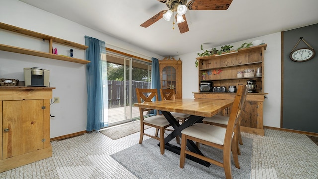 113 Maple Ave, Mount Morris, IL 61054 - dining room featuring a ceiling fan and baseboards