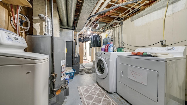 113 Maple Ave, Mount Morris, IL 61054 - washroom with washing machine and dryer, gas water heater, and heating unit