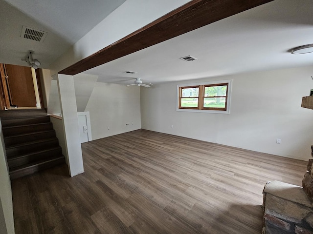 5S426 Columbia St, Naperville, IL 60563 - unfurnished living room with dark wood-type flooring, ceiling fan, and stairs