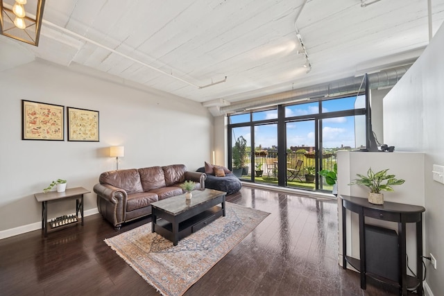 1524 S Sangamon St Unit 512, Chicago, IL 60608 - living area with rail lighting, hardwood / wood-style flooring, and baseboards
