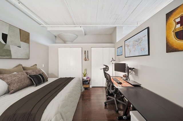 1524 S Sangamon St Unit 512, Chicago, IL 60608 - bedroom featuring two closets, a desk, and dark wood finished floors