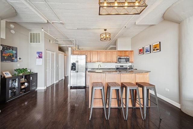 1524 S Sangamon St Unit 512, Chicago, IL 60608 - kitchen with appliances with stainless steel finishes, baseboards, and dark wood finished floors