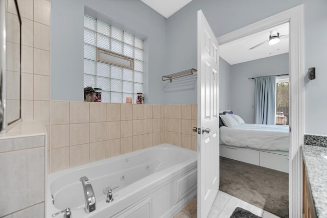 3436 N Harlem Ave Unit 1, Chicago, IL 60634 - ensuite bathroom featuring a tub with jets, tile patterned flooring, and vanity