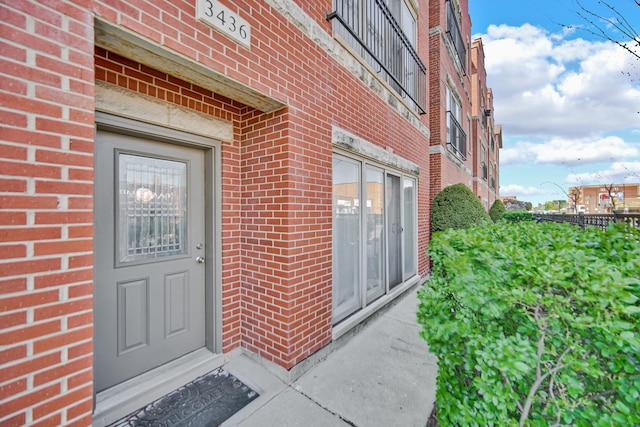 3436 N Harlem Ave Unit 1, Chicago, IL 60634 - view of exterior entry featuring brick siding