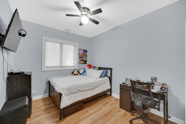 3436 N Harlem Ave Unit 1, Chicago, IL 60634 - bedroom featuring light wood-style flooring, baseboards, a ceiling fan, and a desk