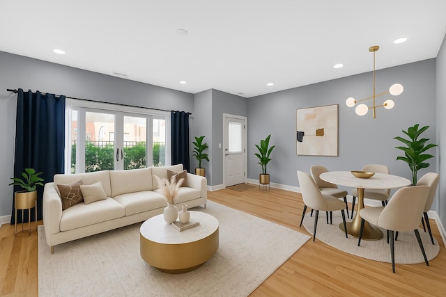 3436 N Harlem Ave Unit 1, Chicago, IL 60634 - living room featuring light wood finished floors, baseboards, and recessed lighting