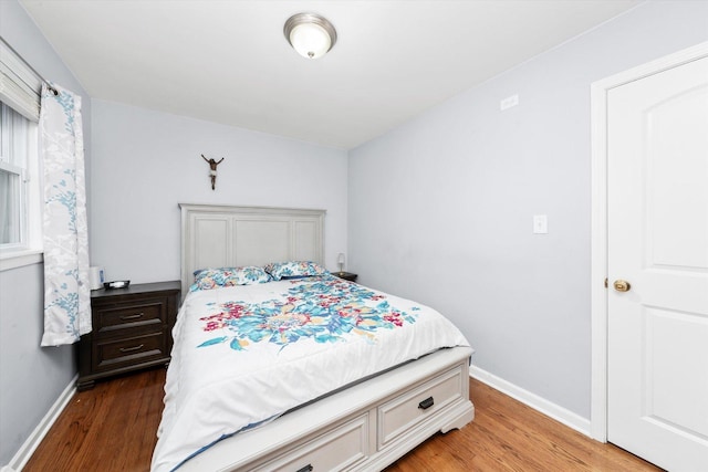 5642 W Dakin St, Chicago, IL 60634 - bedroom with light wood-style flooring and baseboards