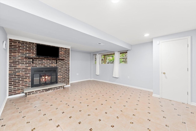 5642 W Dakin St, Chicago, IL 60634 - unfurnished living room featuring baseboards, a brick fireplace, and recessed lighting