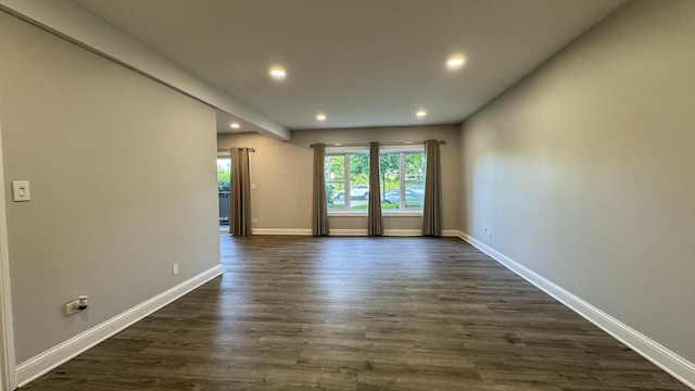 8210 Elmwood Ave Unit 106, Skokie, IL 60077 - spare room with recessed lighting, dark wood-style floors, and baseboards