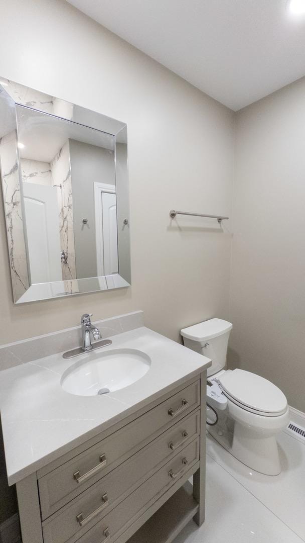 8210 Elmwood Ave Unit 106, Skokie, IL 60077 - bathroom featuring vanity and toilet