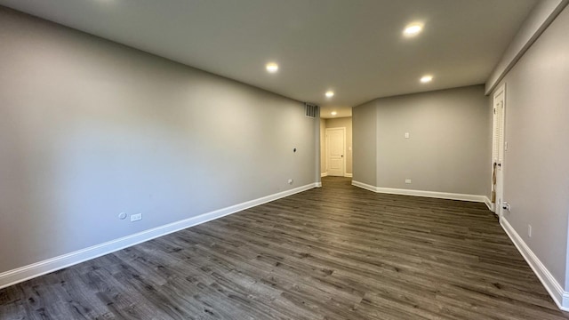 8210 Elmwood Ave Unit 106, Skokie, IL 60077 - unfurnished room featuring recessed lighting, dark wood-style flooring, and baseboards