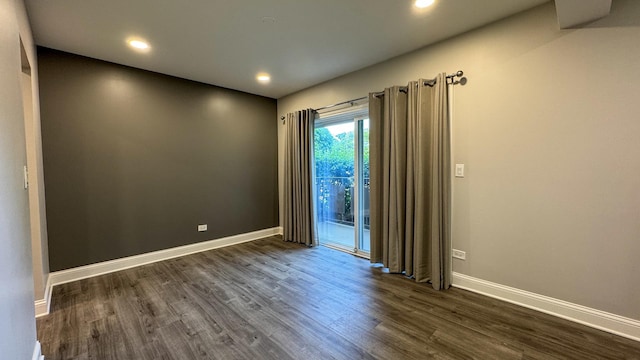 8210 Elmwood Ave Unit 106, Skokie, IL 60077 - empty room with dark wood-style flooring, baseboards, and recessed lighting